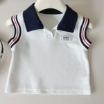Girls White Polo Top and Pleated Skirt Set - Image 3