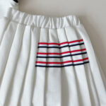 Girls White Polo Top and Pleated Skirt Set - Image 5