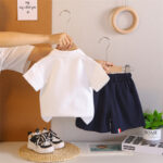 Kids White Polo Shirt and Navy Shorts Set - Image 2