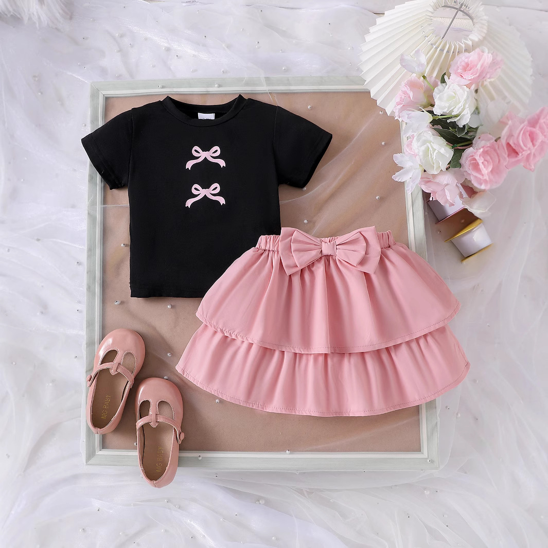 SG-2602018-2.jpg Girls Black Bow Top and Pink Skirt Set - Image 1